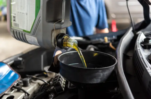 Adding Engine Oil in the Car Engine